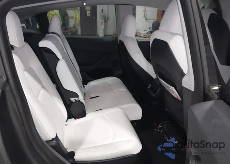 2023 Tesla Model Y Awd/Long Range Dual Motor All-Wheel Drive из США, поврежденный, VIN 7SAYGAEE6PF712391